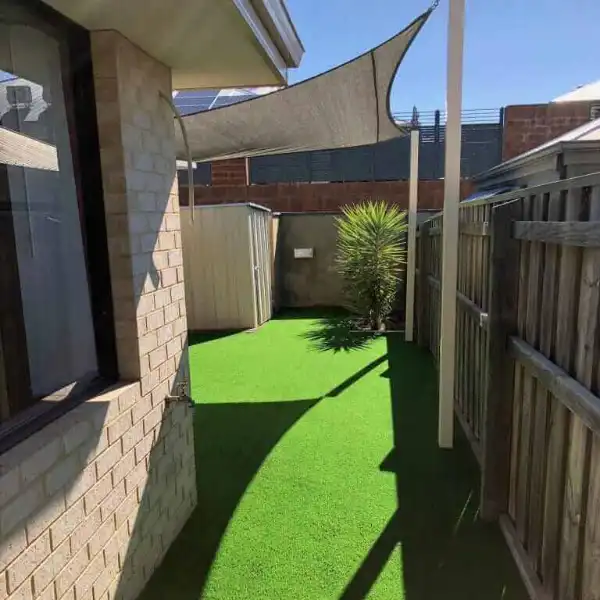 Green Landscaping artificial grass carpet for side yard in Mohammed Bin Zayed City